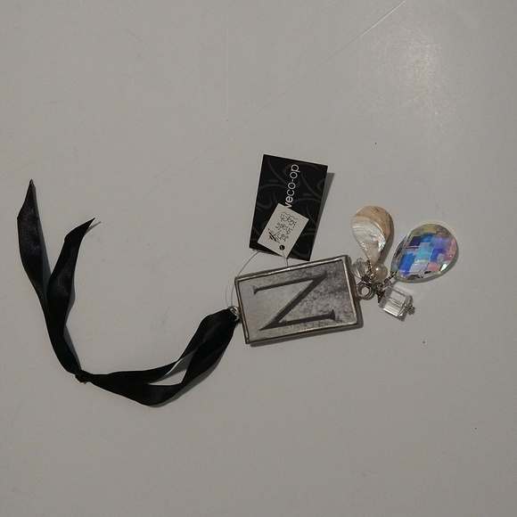 Hanging capital N crystal charm with a black satin tie - Picture 2 of 5